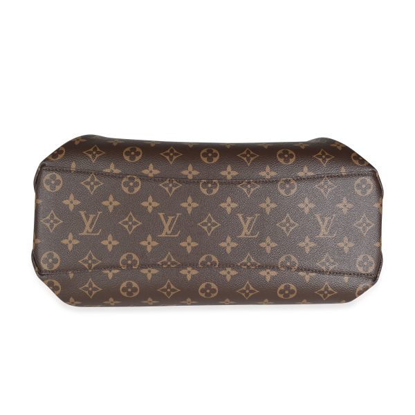 114364 stamp 65afa51f d009 45ee a792 849716610330 Louis Vuitton Monogram Canvas Rivoli MM