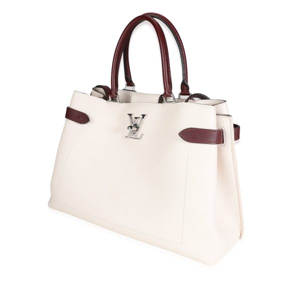 117387 sv 7a4258d7 e1ea 4b79 8d3b 933f0bb5a814 Louis Vuitton Cream Burgundy Grained Calf Leather Lockme Day Bag