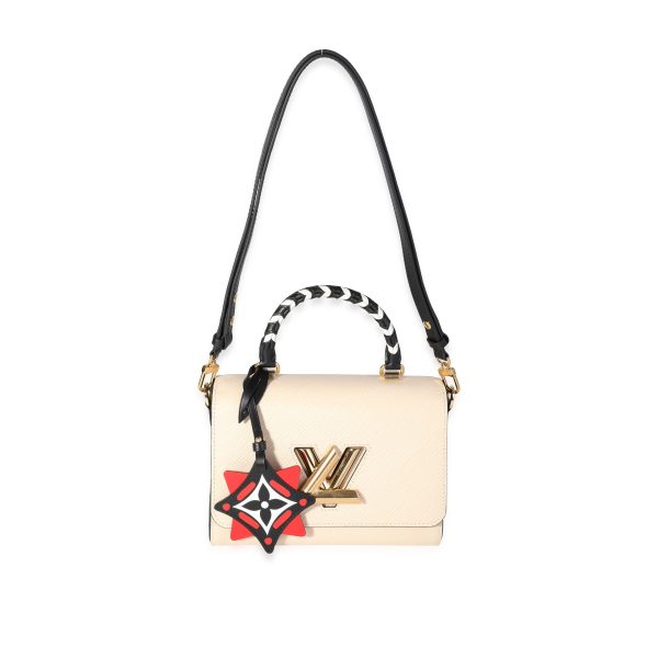 117964 bv 01a5d692 6214 4d6b 9ce9 07fa0d3fd1c0 Louis Vuitton Creme and Black Epi Leather Crafty Twist MM