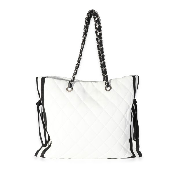 118163 pv 227f199d cbb3 4457 bf6a 06f1ba19ac51 Chanel White Quilted Lambskin Black Grosgrain CC Drawstring Tote