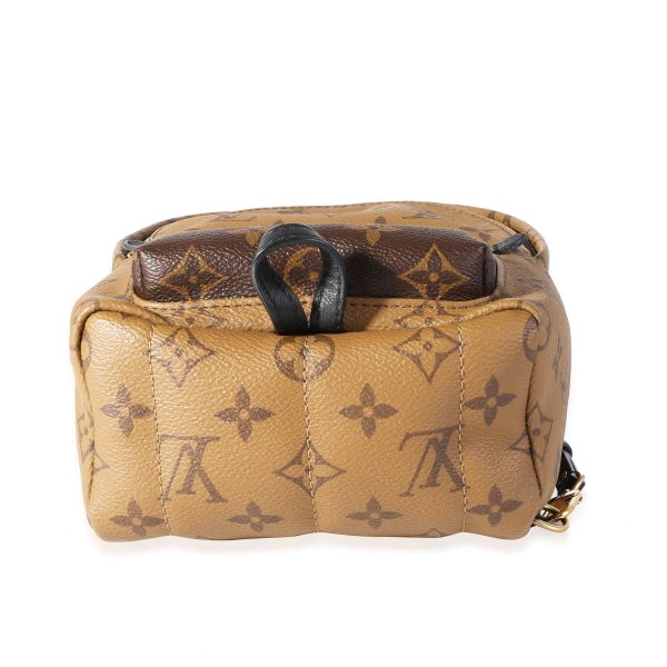 118607 pv 284b5534 e74c 48da a6e8 6f3075cccd21 Louis Vuitton Monogram Monogram Reverse Canvas Palm Springs Mini Backpack