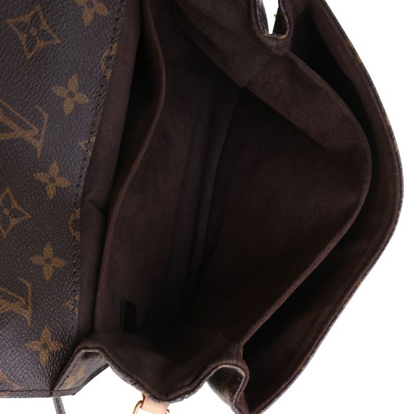 118848 av ea2b2406 8c89 44c7 8cc8 76bc6ca51ea6 Louis Vuitton Monogram Canvas Pochette Métis