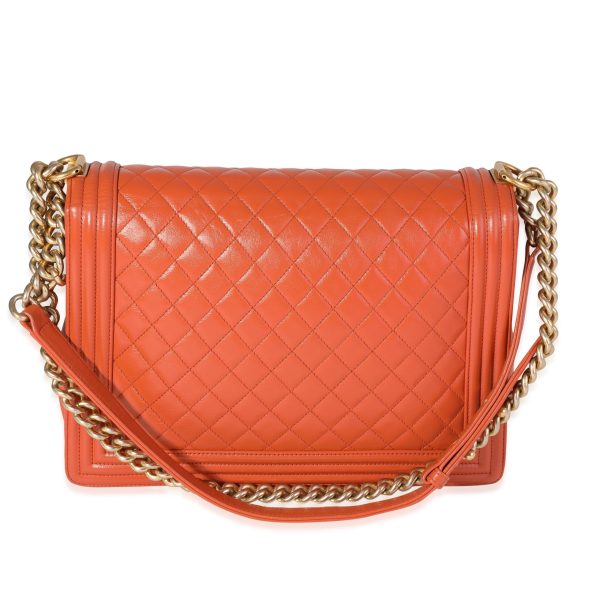 120337 stamp 378f4306 c786 4e0c 9892 0aa0c8491080 Chanel Orange Quilted Leather XL Boy Bag