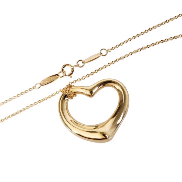 120730 sv f0a9d210 7390 4d77 9982 3140aa22f5e9 Tiffany Co Elsa Peretti Open Heart Pendant in 18k Yellow Gold