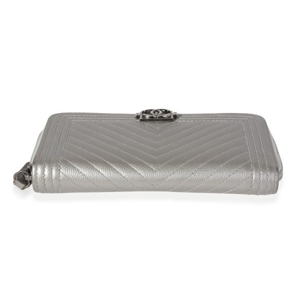 120834 stamp f314b70b a947 45b9 a156 50a6860f493c Chanel Silver Chevron Quilted Zip Around Boy Wallet