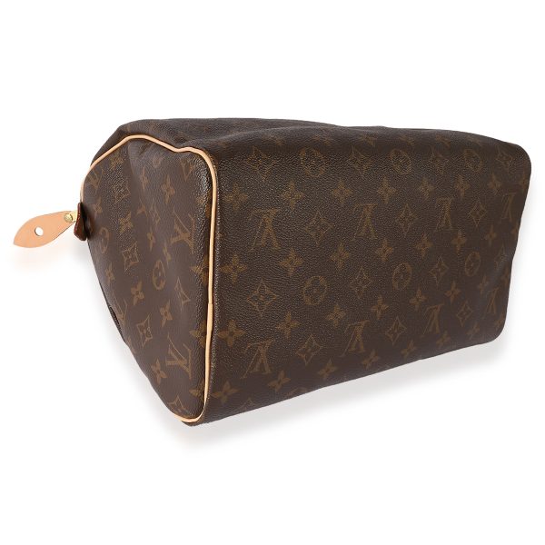 123146 clasp 51e992fd e68f 4480 aa96 5dffb44d6eeb Louis Vuitton Monogram Canvas Speedy 30