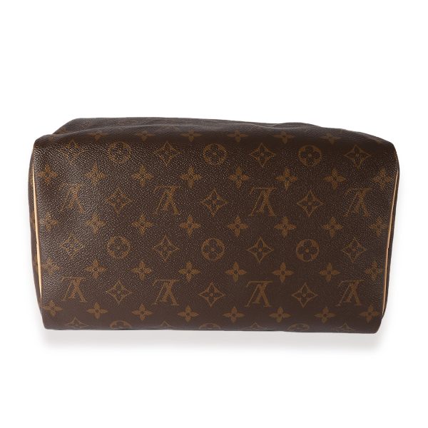 123146 stamp daeec64d e066 449f a2c2 aef292367b69 Louis Vuitton Monogram Canvas Speedy 30