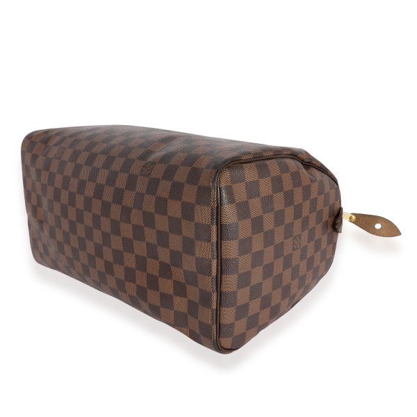 123929 stamp 82eb75fa 4e50 4460 ac84 52c9ce40a531 Louis Vuitton Damier Ebene Speedy 35