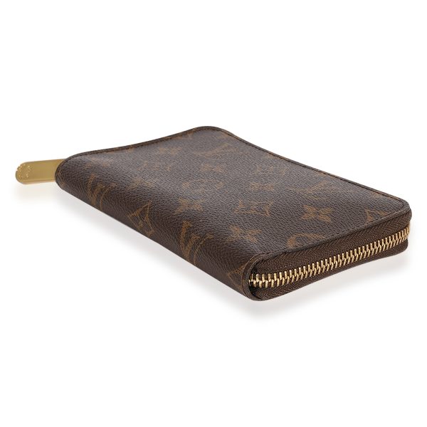 124643 clasp Monogram Canvas Zippy Compact Wallet