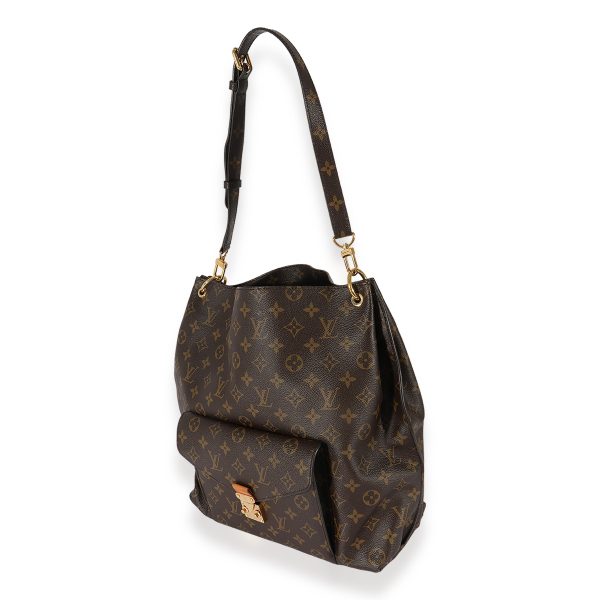 125135 sv bcad677d c0f6 46bf 867b 059319e7c5ba Louis Vuitton Monogram Canvas Metis Hobo