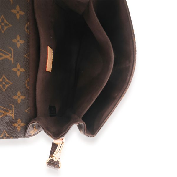 125184 ad2 Monogram Canvas Pochette Métis