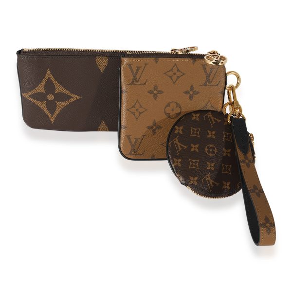 125548 sv 5ffb88d4 2c46 4101 858a e853e95d7fba Louis Vuitton Reverse Monogram Giant Trio Pouch