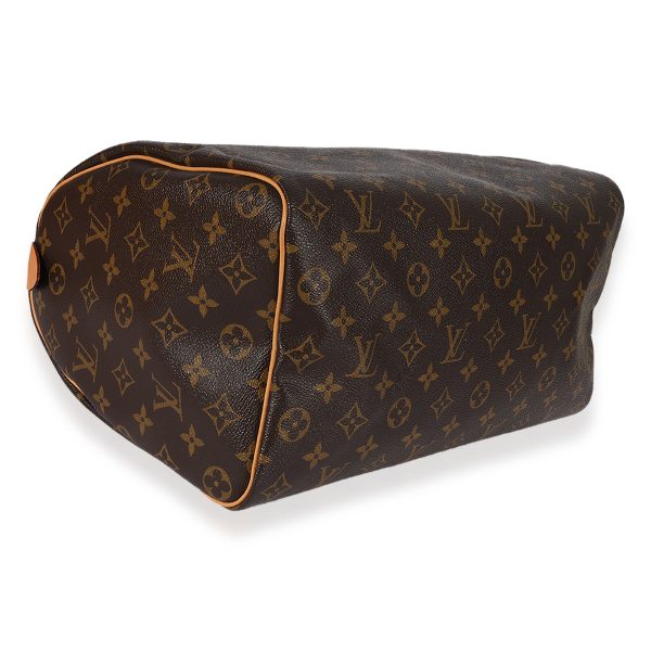 127444 clasp 68deeea5 41c7 42dd 9264 c46d7cdf6973 Louis Vuitton Monogram Canvas Speedy 35