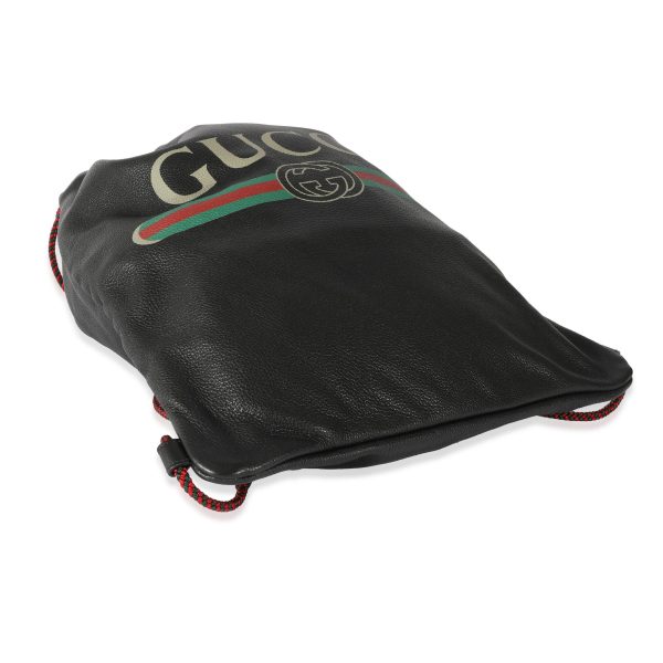 128056 clasp 759e5b10 c1c7 443a a278 781ee46c6b6e Gucci Black Leather Logo Drawstring Backpack