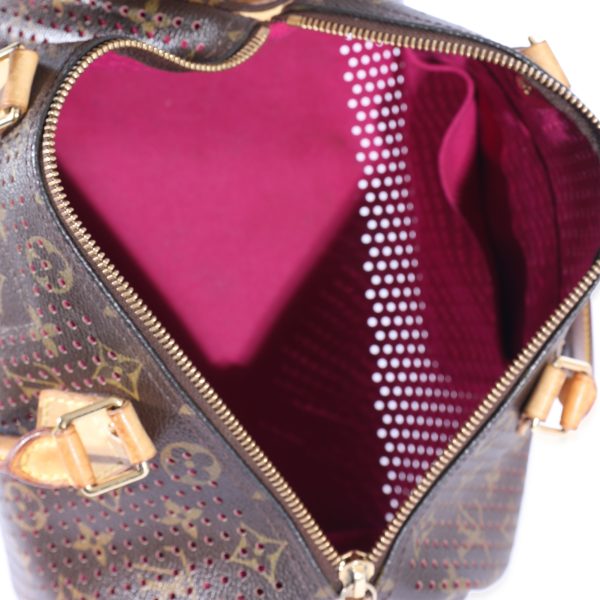 128283 ad1 f82a0cda 9191 498a b898 28c91a003c2b Louis Vuitton Perforated Fuchsia Monogram Canvas Speedy 30