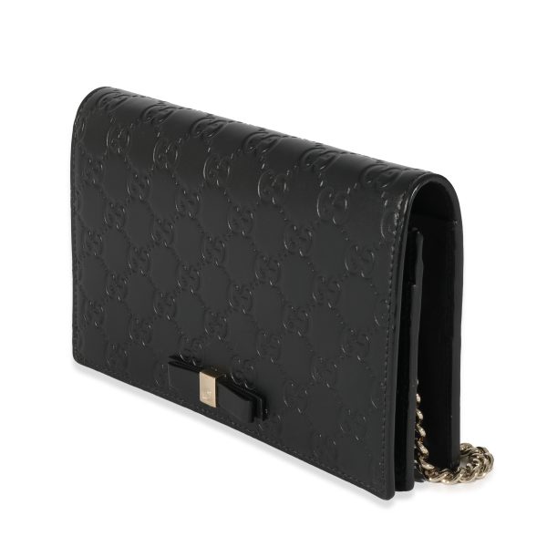 128564 pv 85f73568 6d9f 4df2 8f7c 892bcf1aa9a8 Gucci Black Leather Guccissima Bow Chain Wallet