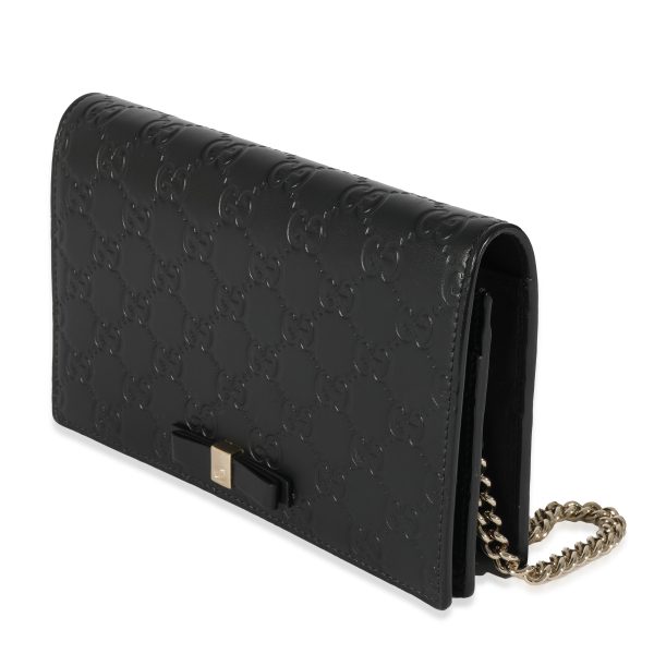 128564 sv d68e9b91 e62a 4210 a1e5 d2b4a5612963 Gucci Black Leather Guccissima Bow Chain Wallet