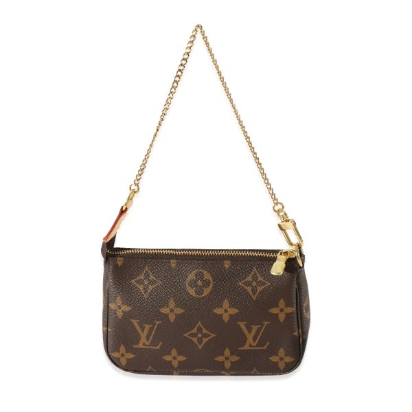 128575 av c36c9c11 3298 4759 9745 0b2f579dd71d Louis Vuitton Monogram Canvas Mini Pochette