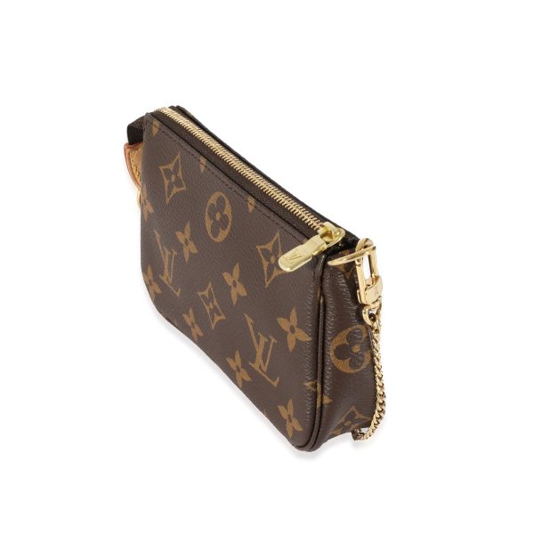 128575 sv dc1d3dfc 44dc 4ad4 a113 06d27e5c4b6c Louis Vuitton Monogram Canvas Mini Pochette