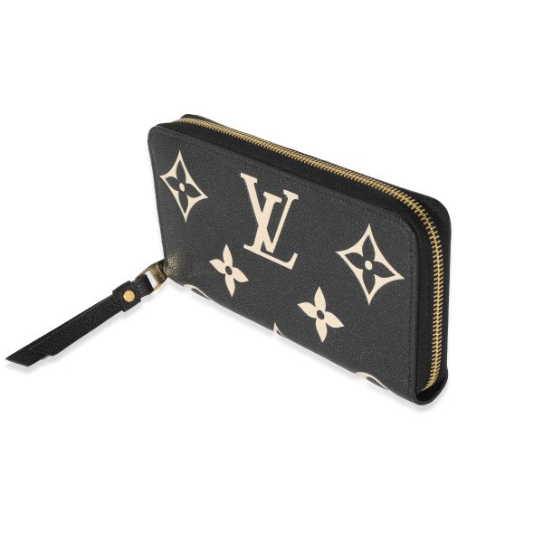 128586 sv 0ec3979d 82c1 43ba aa95 6722ab9ec6ec Louis Vuitton Bicolor Empreinte Monogram Zippy Wallet