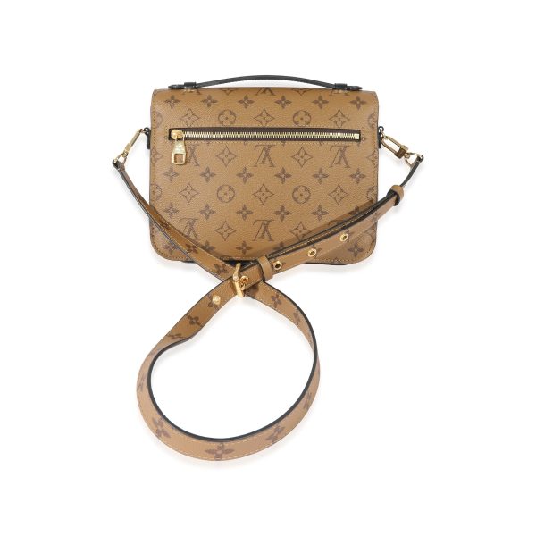 128648 pv aca8cc62 c7b6 4148 bc7a 90c1137dae60 Louis Vuitton Monogram Reverse Pochette Metis