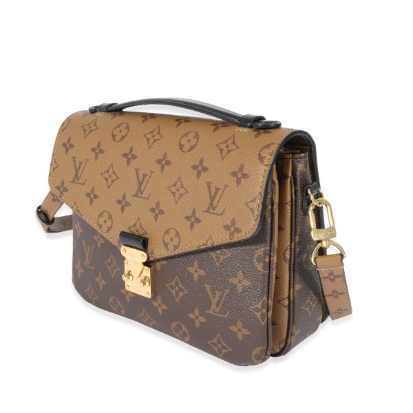 128648 sv 20d4d747 f8c5 46f1 b72b b27284478954 Louis Vuitton Monogram Reverse Pochette Metis