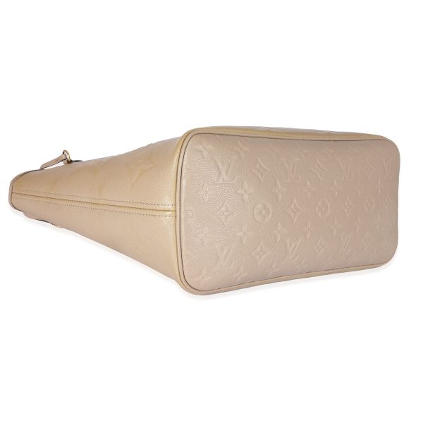 129403 clasp 6989454d 0ee6 4161 a520 54b00cada22c Louis Vuitton Turtledove Empreinte Neverfull MM