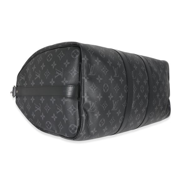 130042 clasp d47c75bb a10f 4959 b151 68ed42945a8e Louis Vuitton Monogram Eclipse Keepall Bandouliere 45