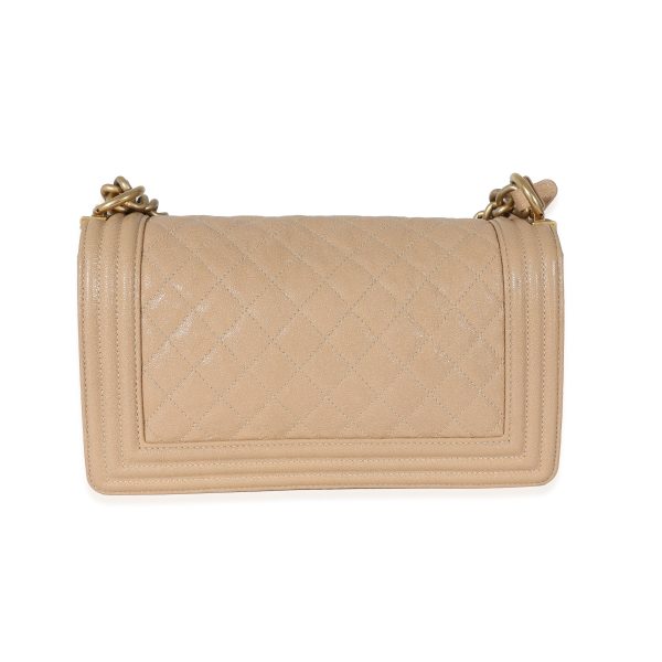 130807 pv 345dddb1 e1b4 47e0 b362 f6572ac45042 Chanel Beige Quilted Caviar Medium Boy Bag