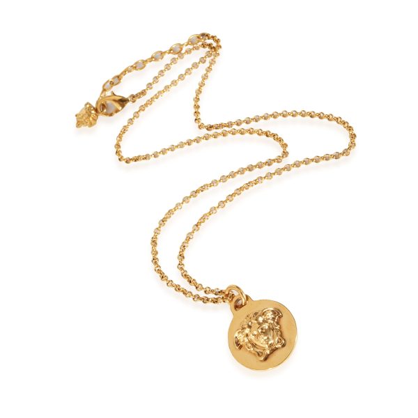 131419 bv 39dad700 12f7 41bc 9b48 f00f081af243 Versace Medusa Gold Tone Pendant