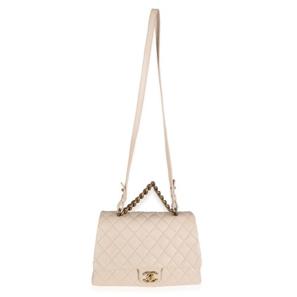 131875 stamp Chanel Beige Quilted Sheepskin Trapezio Flap Bag