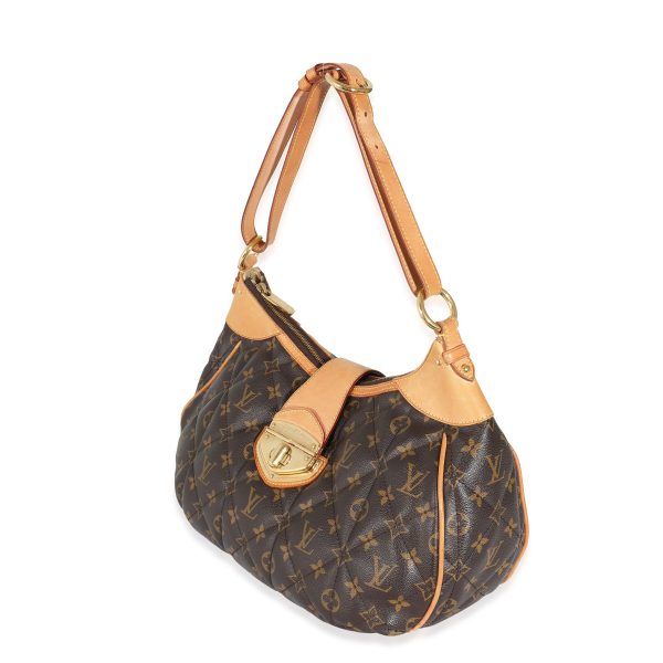 132148 sv 25232bf6 2e88 46c3 aad7 04fe4d22ac55 Louis Vuitton Triple Quilted Monogram Canvas Etoile City