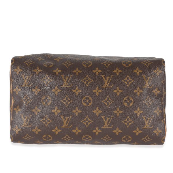 132873 stamp 71bb4936 c9bc 4be3 88ce f348acf73042 Louis Vuitton Monogram Canvas Speedy 30