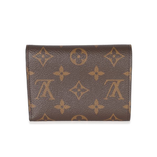 133771 pv a00656d0 fe4e 4ec6 b67e f375fc797d1b Louis Vuitton Monogram Canvas Victorine Wallet