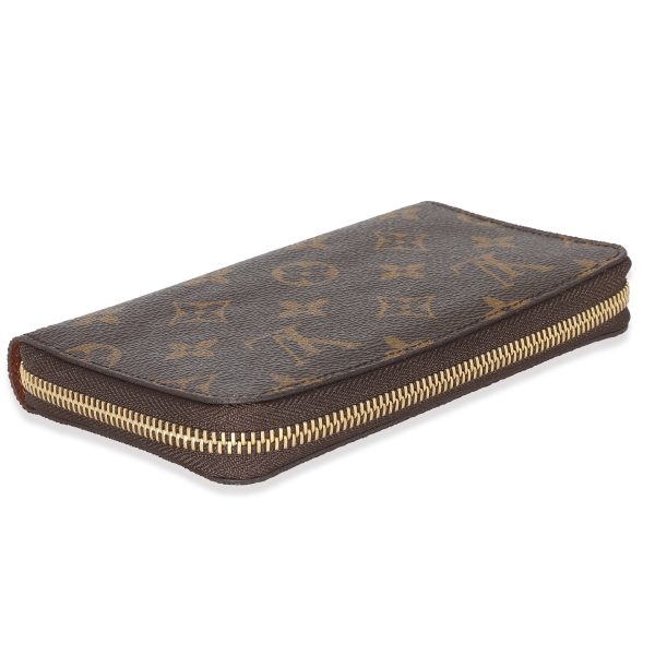 133891 stamp 7466c883 5f70 4dda af31 4dcba01829b7 Louis Vuitton Monogram Canvas Zippy Compact Wallet