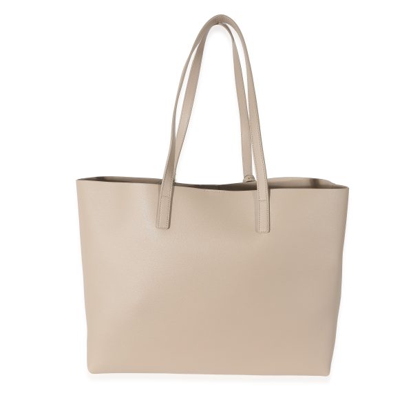 134032 stamp 09d7b759 9fa5 40dc babf 8e0775621aef Saint Laurent Dark Beige Supple Leather East West Shopping Tote