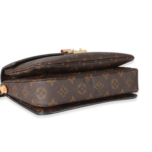 134154 clasp f89f761f 7b06 423a 99e3 0a1b6ca9cc26 Louis Vuitton Monogram Canvas Pochette Metis