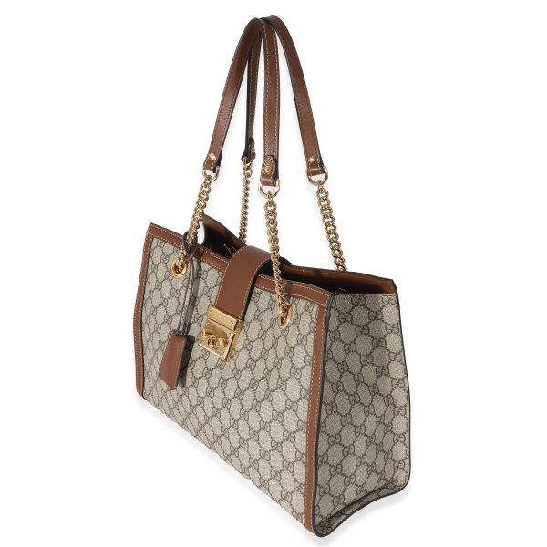 134418 sv 89077041 c846 4f7b 8d34 f21114dc8340 Gucci Beige GG Supreme Medium Padlock Tote