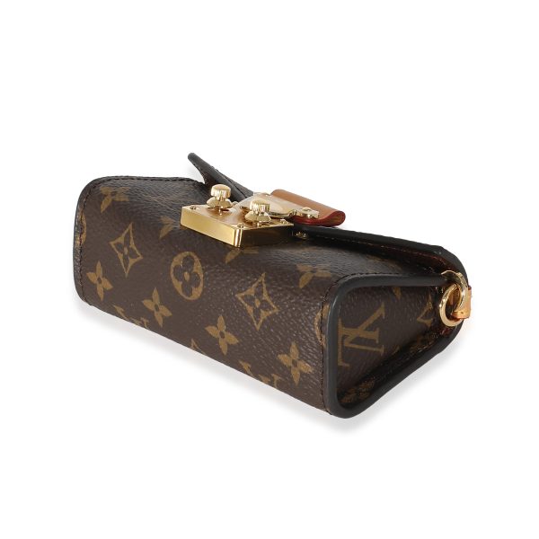 135587 ad2 Louis Vuitton Monogram Canvas Bitsy Pouch