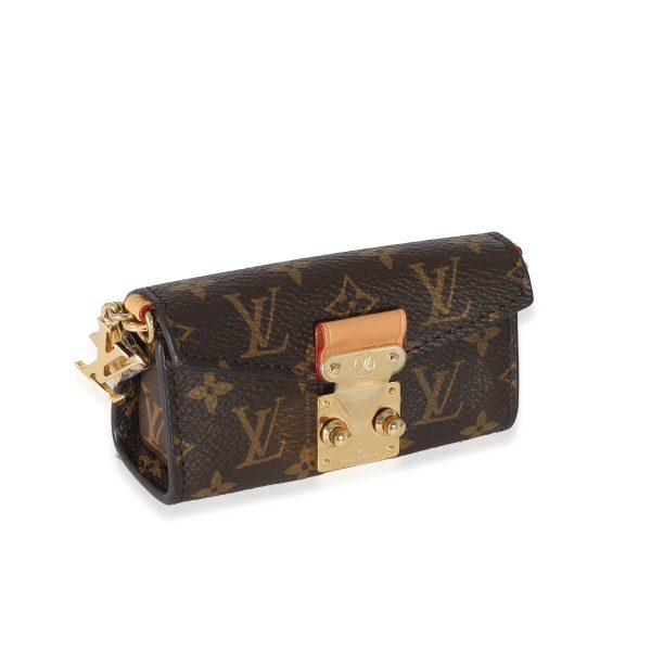 135587 clasp Louis Vuitton Monogram Canvas Bitsy Pouch