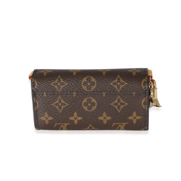 135587 pv Louis Vuitton Monogram Canvas Bitsy Pouch