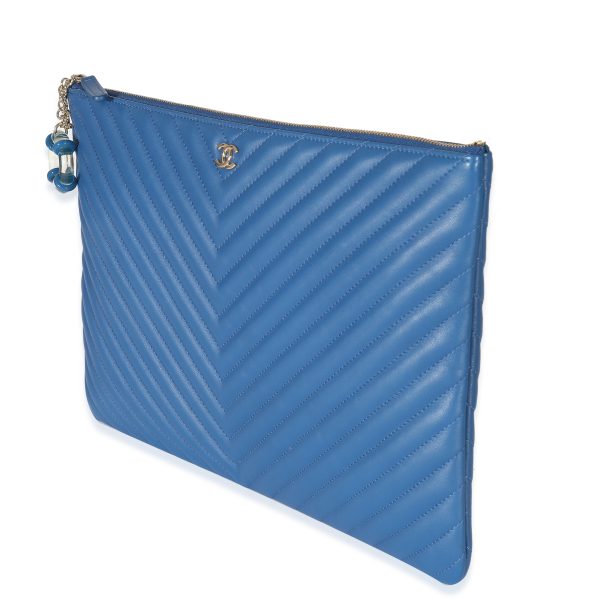 135692 sv Chanel Blue Quilted Chevron Lambskin Large O Case