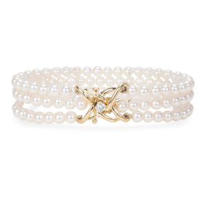 Tiffany Co Triple Strand Pearl Bracelet with Diamond Clasp Balenciaga Paper Shoulder Bag Black