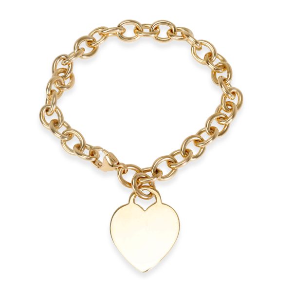 099137 bv a824ddef a017 47af a099 10da072d4647 Tiffany Co Heart Tag Charm Bracelet in 18K Yellow Gold