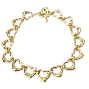 Tiffany Co Elsa Peretti Open Heart Links Toggle Bracelet in 18KT Yellow Gold Chanel Cocomark Vanity Bag