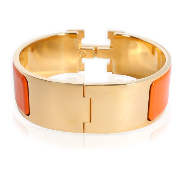 103551 bv b830d4cf 2acd 49e7 b2cd 0e6be836dd6c Hermes Clic Clac H Orange Bracelet with Gold Plated Hardware