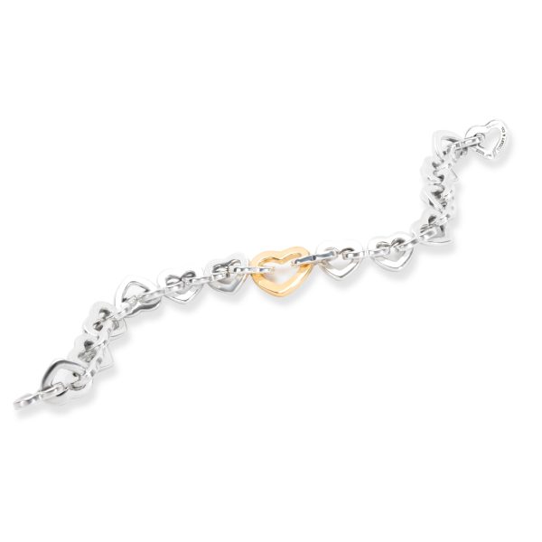 103922 pv fd5522ce babd 4d46 9c0e 9ad2696164cd Tiffany Co Linked Open Hearts Bracelet in 18K Yellow Gold Sterling Silver