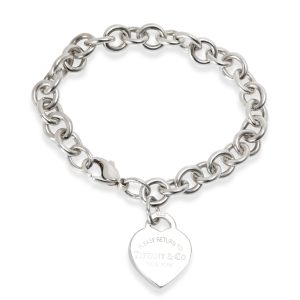 Tiffany Co Heart Tag Bracelet in Sterling Silver Chanel Matelasse Chain Shoulder Bag Leather Black Gold Metal Fittings