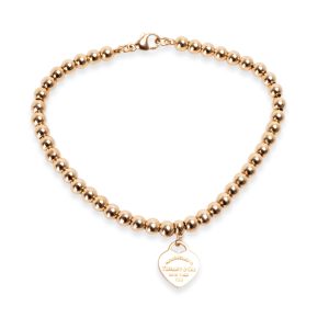 Tiffany Co Return to Tiffany Mini Heart Tag Bead Bracelet in 18k Rose Gold FENDI Baguette Nappa Leather Shoulder Bag Pink