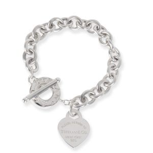 Tiffany Co Heart Tag Return to Tiffany Bracelet in Sterling Silver Louis Vuitton Evora MM Handbag Damier Ebene Leather Brown